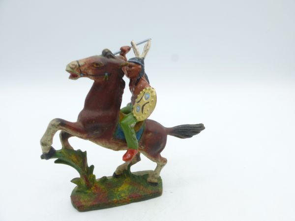 Indian on horseback, throwing spear
