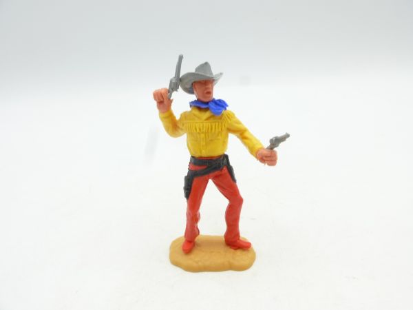 Timpo Toys Cowboy stehend, 2 Pistolen wild schießend