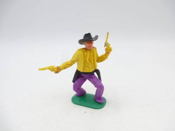 Timpo Toys Cowboy 1. Version, tiefgelb, 2 Pistolen wild schießend