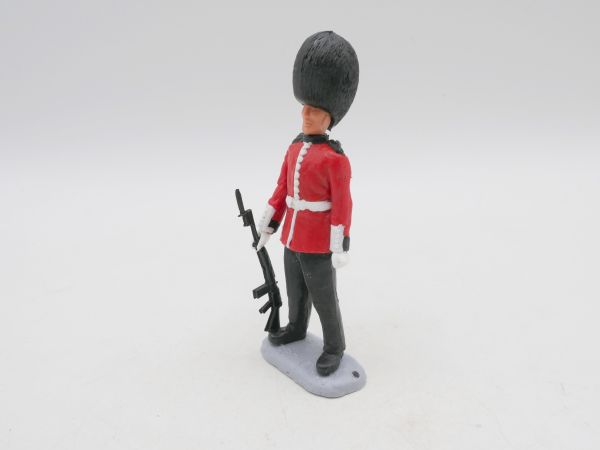 Timpo Toys Guardsman standing, rifle put down at side