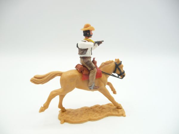 Timpo Toys Cowboy 4. Version reitend, Gewehr schießend