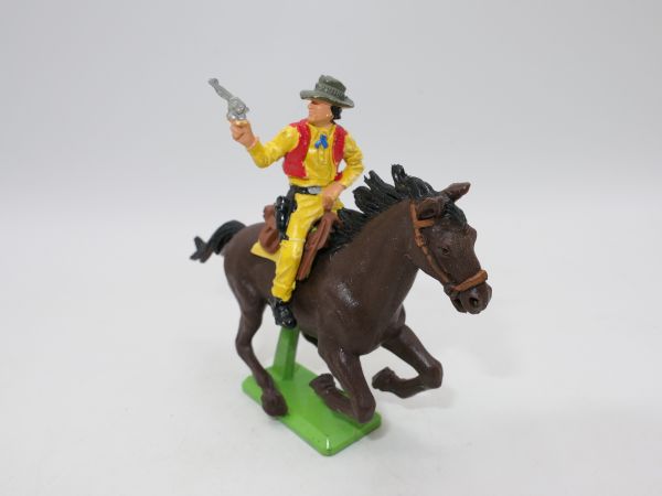 Britains Deetail Cowboy on horseback, shooting pistol sideways