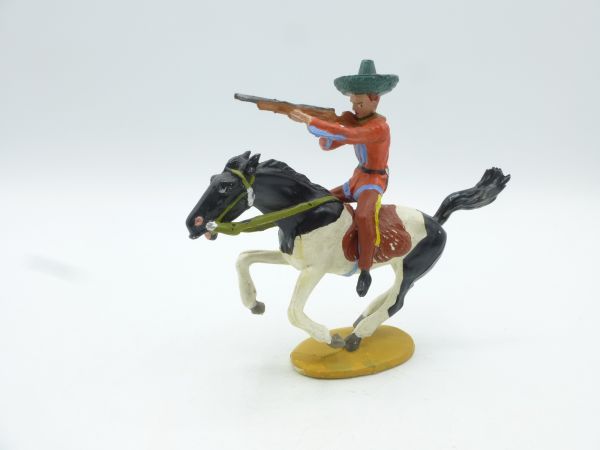 Merten Mexican riding on mustang, firing rifle
