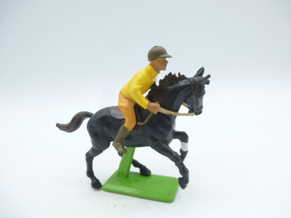 Britains Swoppets Jockey (dark yellow) on horse - with metal base