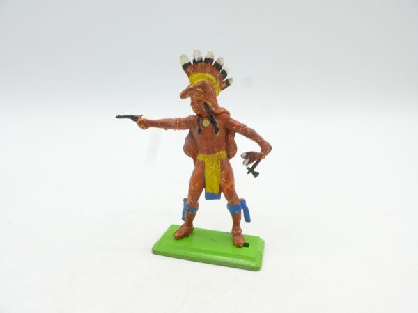 Britains Deetail Indian standing, shooting pistol, with tomahawk