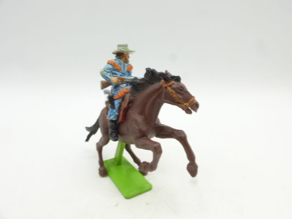Britains Deetail Cowboy riding, rifle in front of his body