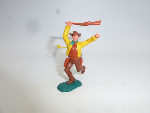 Timpo Toys Cowboy 2nd version running hit by arrow, yellow