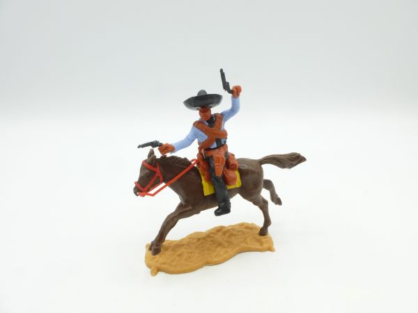 Timpo Toys Mexican riding firing wild with 2 pistols, black pistols