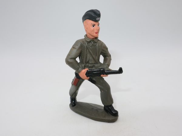 Soldier with black beret advancing with MG (plastic) - unused