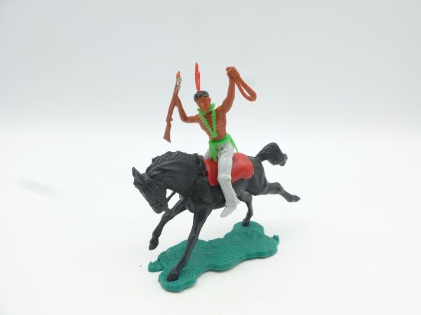 Lone Star Indian riding with rope + gun