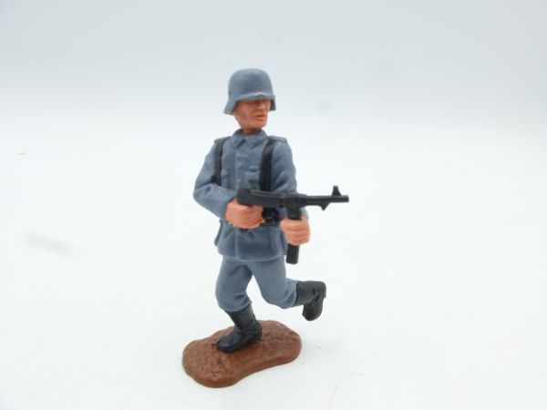 Timpo Toys German running firing with MP, fixed helmet