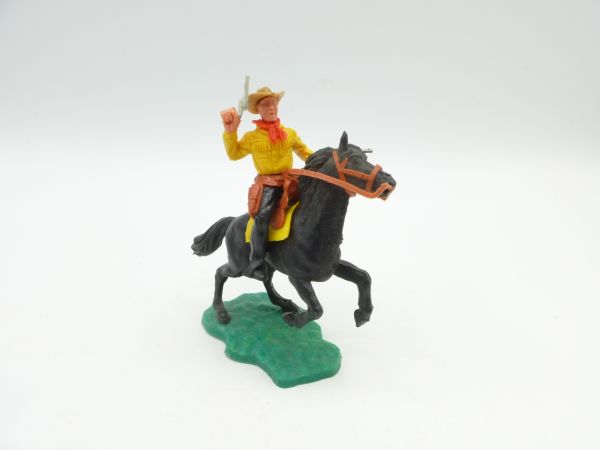 Timpo Toys Cowboy riding, firing wild with 2 pistols