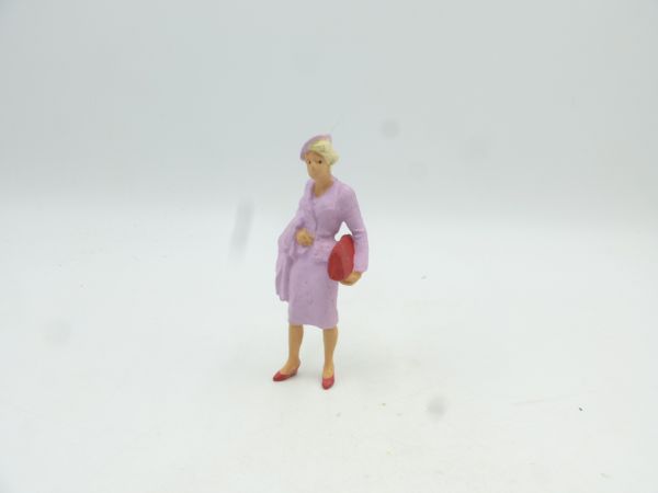 Preiser 1:22,5 Traveller lady standing with bag + coat (lilac)