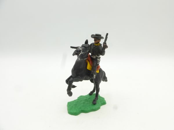 Timpo Toys Cowboy schwarz, reitend mit 2 Pistolen - tolle Figur