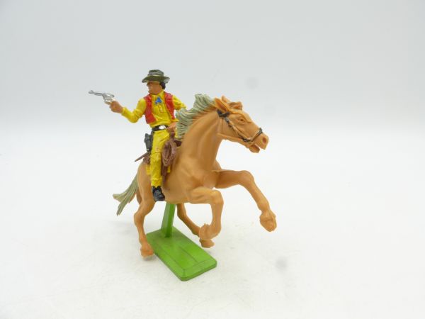 Britains Deetail Cowboy riding, pistol sideways