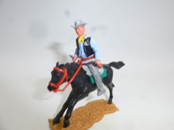 Timpo Toys Cowboy 3. Version (großer Kopf) reitend mit 2 Pistolen