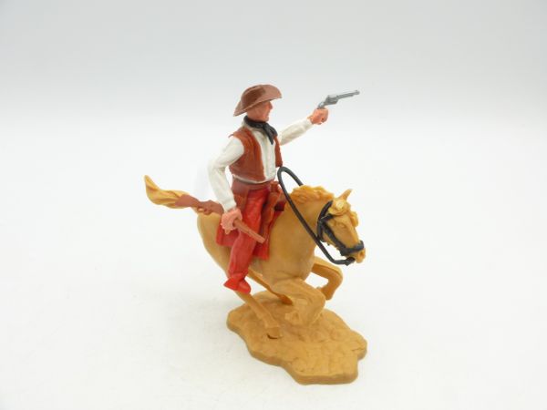 Timpo Toys Cowboy 2. Version reitend mit Pistole + Gewehr