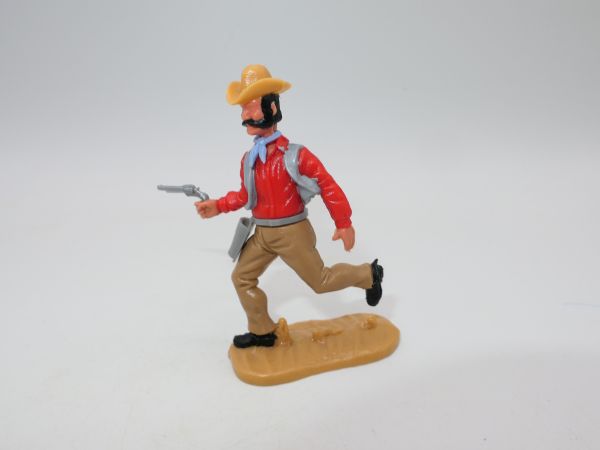 Timpo Toys Cowboy 4. Version laufend mit Pistole, beige Hose