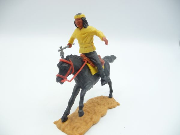 Timpo Toys Apache riding yellow, holding tomahawk