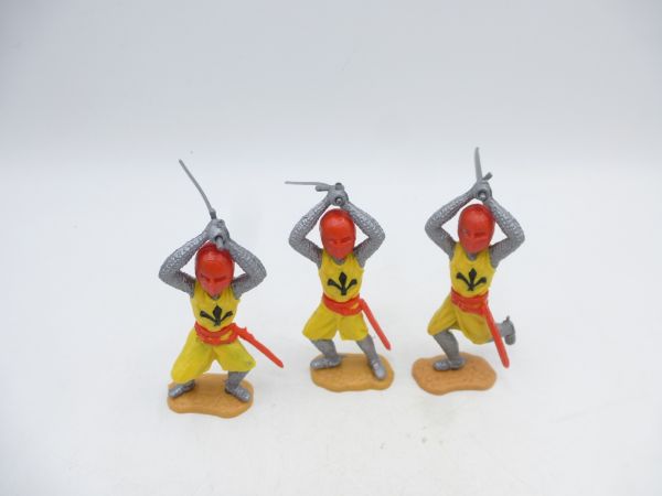 Timpo Toys 3 Mittelalterritter gelb/rot, beidhändig schlagend