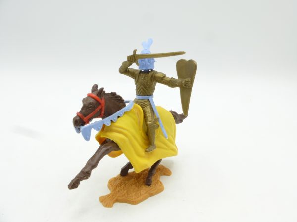 Timpo Toys Goldritter reitend, mit Schwert abwehrend + Schild
