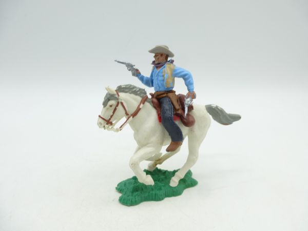 Britains Swoppets Cowboy riding with 2 pistols