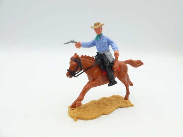 Timpo Toys Cowboy 3. Version reitend mit Geldtasche + Pistole
