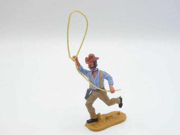 Timpo Toys Cowboy 4th version running with lasso, braces ochre