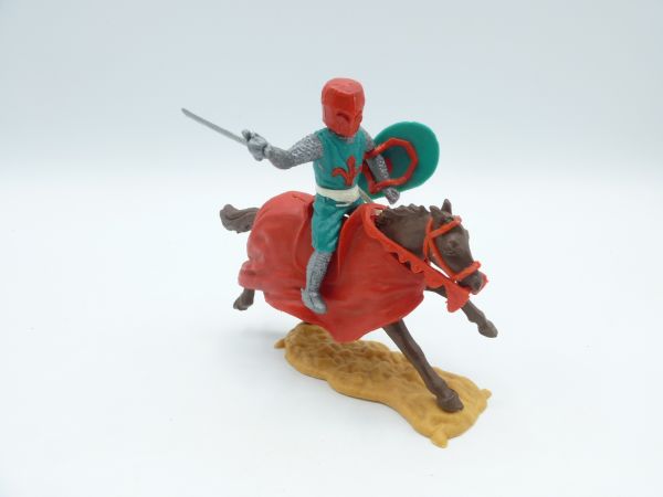 Timpo Toys Mittelalterritter reitend, grün/rot mit Schwert