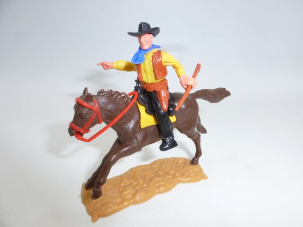 Timpo Toys Cowboy 2nd version riding, rifle sideways, pointing