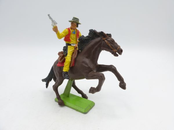 Britains Deetail Cowboy riding, shooting pistol