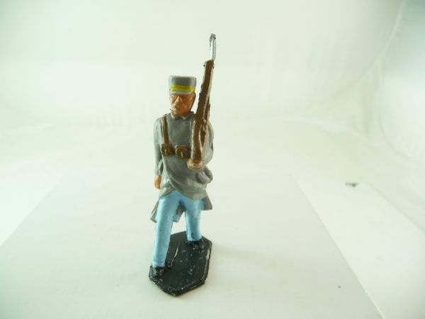 Lone Star Foreign legionnaire marching with rifle - rare