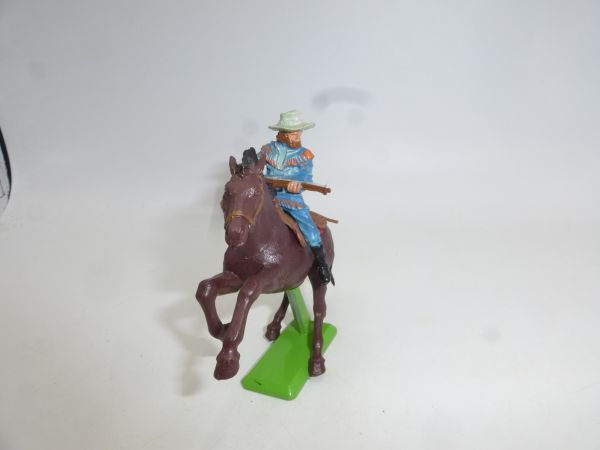 Britains Deetail Cowboy on horseback, rifle in front of his body