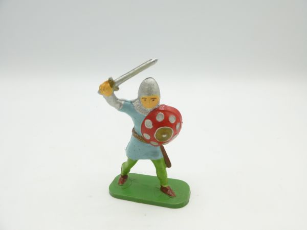 Knight standing with sword above + shield