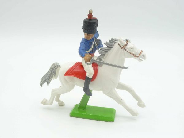 Britains Deetail Waterloo; soldier riding, blue, holding sabre down, looking to the right