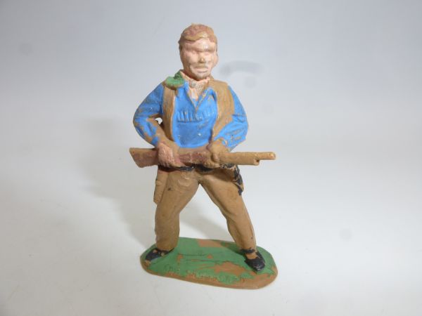 Timpo Toys Solid Cowboy, rifle at the ready, beige trousers