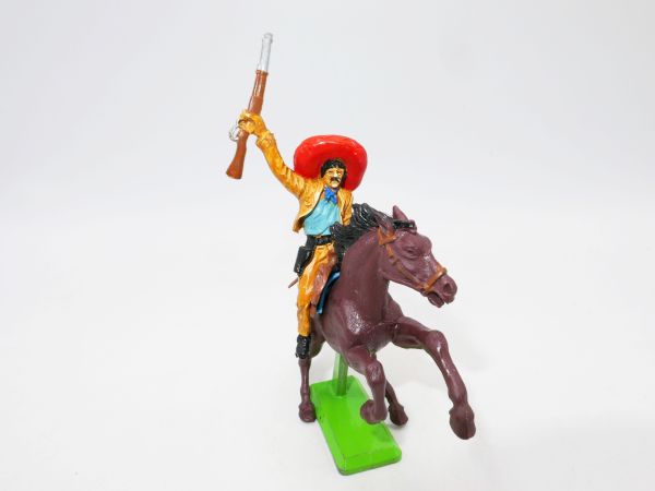 Britains Deetail Mexican on horseback with pistol, holding up rifle