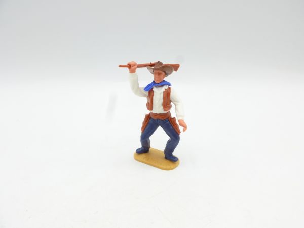 Timpo Toys Cowboy 2. Version stehend, Gewehr schlagend