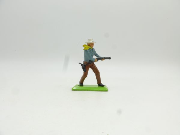 Britains Deetail Cowboy standing, shooting pistol from hip