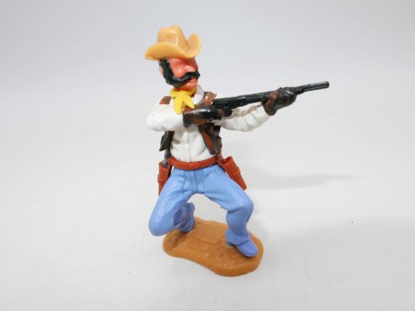 Timpo Toys Cowboy 4. Version hockend Gewehr schießend