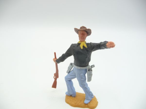 Timpo Toys Cowboy 2nd version standing, holding rifle sideways