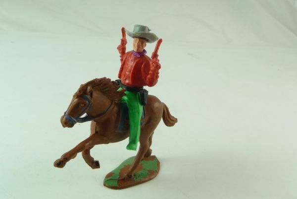 Charbens Cowboy mounted, firing wild with 2 pistols