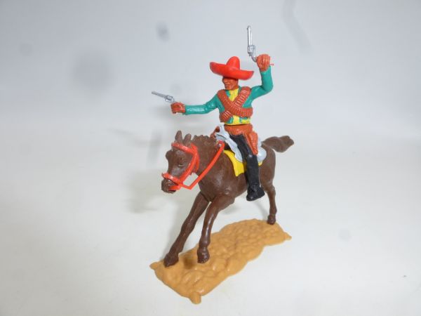Timpo Toys Mexican riding, green, firing 2 pistols wildly