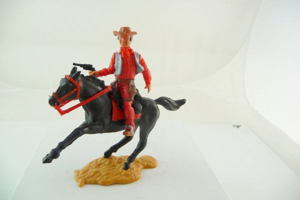 Timpo Toys Cowboy reitend mit seltenem rotem Unterteil - sehr guter Zustand