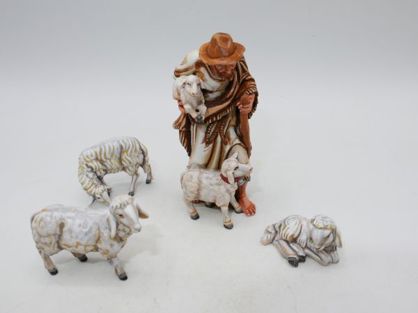 Hirte mit Schaf + Lamm + 3 Schafe, Holzfiguren 7 cm Serie