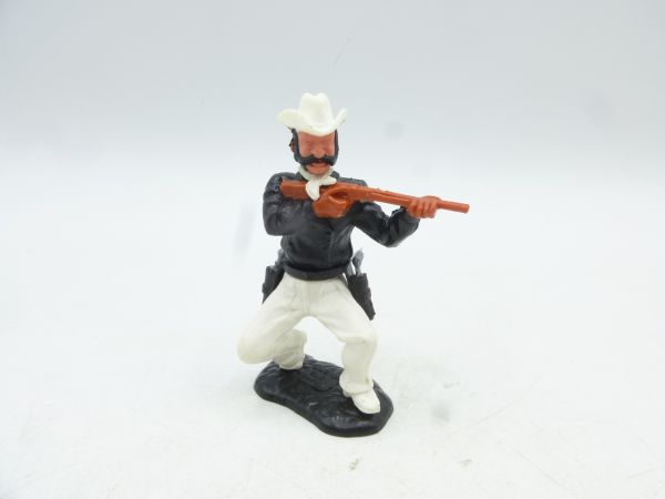 Timpo Toys Cowboy hockend mit kurzem Gewehr - tolle Farbkombi