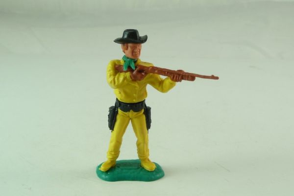 Timpo Toys Cowboy 3rd version, firing with rifle - great colour combination