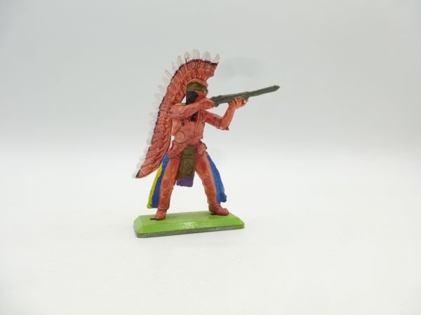 Britains Deetail Indian with long feather headdress, shooting rifle