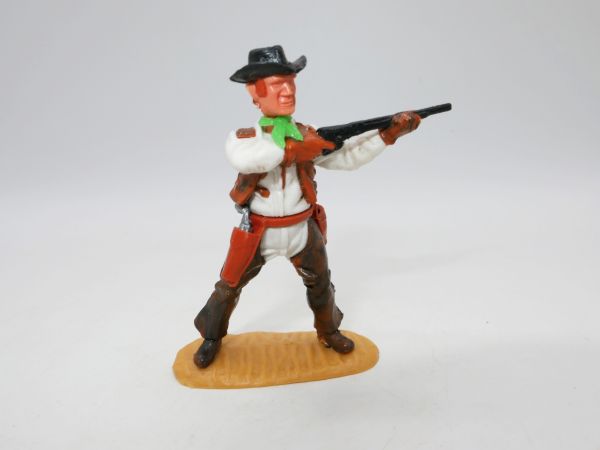 Timpo Toys Cowboy 4. Version stehend Gewehr schießend, mit Chaps