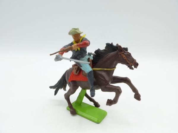 Britains Deetail Cavalryman riding with rifle + sabre